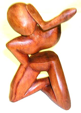 Office decoration - yogi man abstract carving with one hand cover ear and another touching leg