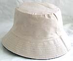Double sided cotton bucket hat, one side of white, and flipped over for purple color with zipper design