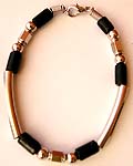 Mini curvy Bali silver strip and black wooden beads forming fashion bracelet 