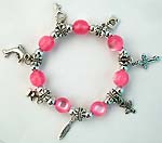 Bali silver and pink color beaded stretchy charm bracelet with multi patterns, dolphin, star, leaf, cross, key and arrow in heart 