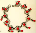 Heart pattern red stone embedded fashion bracelet 