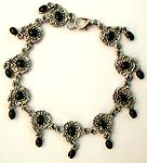 Oval imitation black stone embedded flower pattern fashion bracelet 