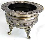 Flat top design ancient oriental iron incense burner with stand and Chinese word phrase means 'Holy light shining all over the world'