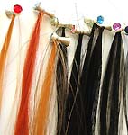 Assorted color clip-on synthetic hair strip