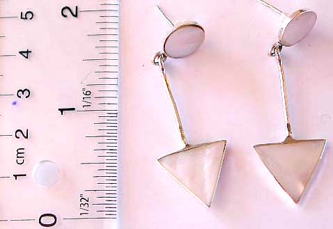 Sterling silver earring with a rounded white seashell embedded on top and a triangular white seashell handing on bottom