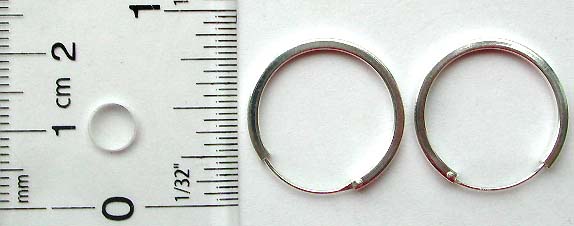 Flat circular loop design sterling silver earring 