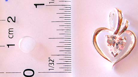Cut-out heart shape pattern sterling silver pendant with a clear heart shape cz hang in middle