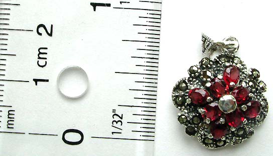 4 oval shape red garnet stones forming cross pattern sterling silver pendant with a mini marcasite embedded in middle