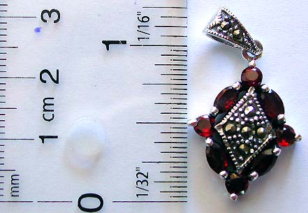 Multi red garnet stone surrounded marcasites stone embedded geometric pattern design sterling silver pendant