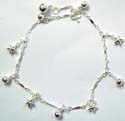 Curved strip pattern forming sterling silver anklet with multi star pattern attached on 
