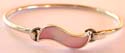 Sterling silver bangle with wavy pink mother of pearl seashell in middle