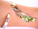 Curved-down pattern design sterling silver bangle with genuine abalone seashell embedded