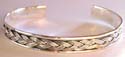 Carved-out braided pattern design sterling silver bangle 