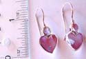 Fish hook sterling silver earring with heart shape purple seashell embedded