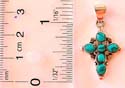 Multi mini rounded turquoise stone forming central square design cross pattern sterling silver pendant