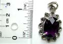 Multi mini marcasites stone embedded pipeapple pattern sterling silver pendant with an oval amethyst stone inlay in middle