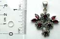 Multi marcasites and red garnet stone forming 4 flower pattern attached pattern sterling silver pendant