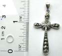Multi marcasites embedded loop forming cross pattern sterling silver pendant with flower pattern centre