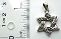 Cut-out Doublr triangle forming star pattern sterling silver pendant