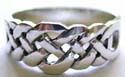 Thailand 925. sterling silver ring with cut-out complicated knot work pattern design in middle