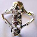 Sterling silver ring with empty eye hole cut-out double skull pattern design in middle