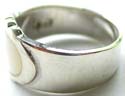 Sterling silver ring with horizontally laid oval shape white mother of pearl seashell embedded in middle