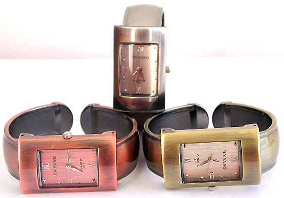 Copper color fashion bangle watch in long rectangular shape design