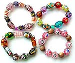 Assorted color and design hand painted glass bead forming strecthy fashion bracelet