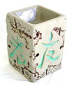 Ceramic oil warmer with carved chinese character means 'Friend'