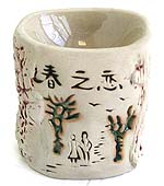 Ceramic oil burner with scene of couple walking in spring, carved chinese character means 'Love in the spring'