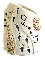 Ceramic oil warmer with red yellow flower and carved feet pattern and Chinese phrase means 'Every step that you took in these years' 