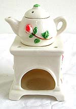 Milky white smooth finishing ceramic tea pot oil burner