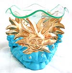 Resin oil burner with three sun face holding flower pattern glass plate and blue stand