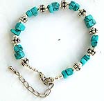 Fashion bracelet with antique silver beads and double genuine turquoise stone beads connected