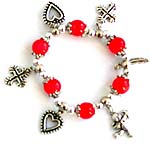 Orange color beaded strecthy charm bracelet with cross, leaf, heart and Apolo angel and leaf pattern 