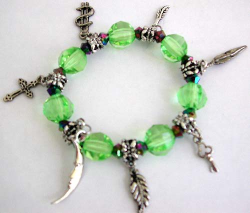 Charm bracelet wholesale online offer light green facet and silver beaded fashion charm stretchy bracelet with figure, leaf, cross, key, dollar sign and moon