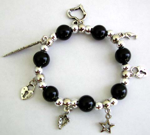 Multi black round beads and silver beads forming stretchy fashion charm bracelet with assorted design figure, leaf, cross, key heart and star