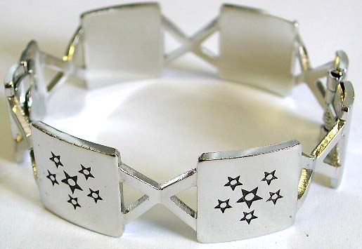 Cutout rectangle and cross pattern forming fashion bangle bracelet with mini black star pattern 
