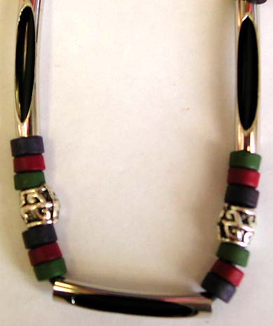 Stylish tube necklace with multi long link metal and red and green color beads forming industrial fashion necklace