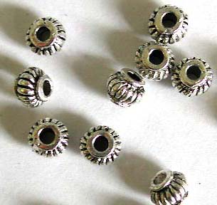 Bali rounded fashion beads with line pattern decor