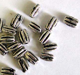 Carved black line rice grain silver beads