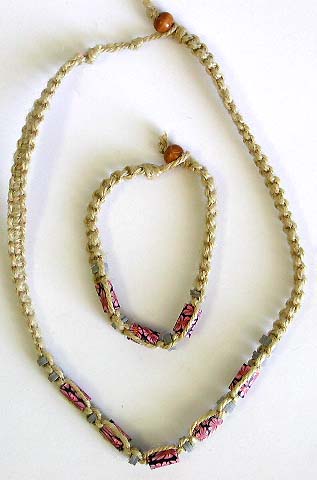 Fashion necklace and bracelet set with light pink beads embedded in middle, bead and double loop to close