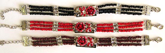 Flower CZ bracelet beaded jewelry at wholesale prices. Multi color beads forming 3-strings Tibetan fashion bracelet with multi red cz forming flower pattern set in middle, assorted color  