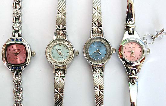 Lady wrist watch wholesale - lady metal band watches, some with charms dangling