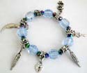 Multi light blue facet beads and silver beaded fashion charm strecthcy bracelet with assorted design figure, leaf, key, lock, moon and dollar sign 