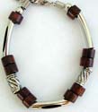 Industrial fashion bracelet with linked metal, Bali silver bead asnd brown wooden bead 
