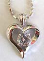 Fashion necklace with a rounded clear cz embedded cut-out heart love fashion pendant, lobster claw clasp to close 