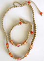 Orange and yellow beads embedded fashion hemp strip necklace and bracelet settie knot to close