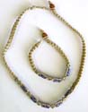 Fashion necklace and bracelet set with light purple beads embedded in middle, bead and double loop to close