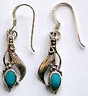Leaf pattern sterling silver earring with oval shape turquoise stone